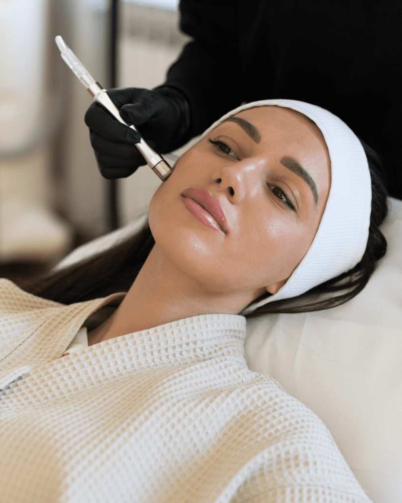 Untitled design (11) A woman getting her face waxed at the spa